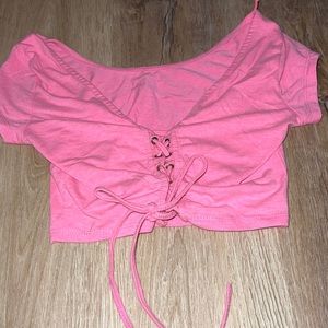 Pink crop top with laced up back